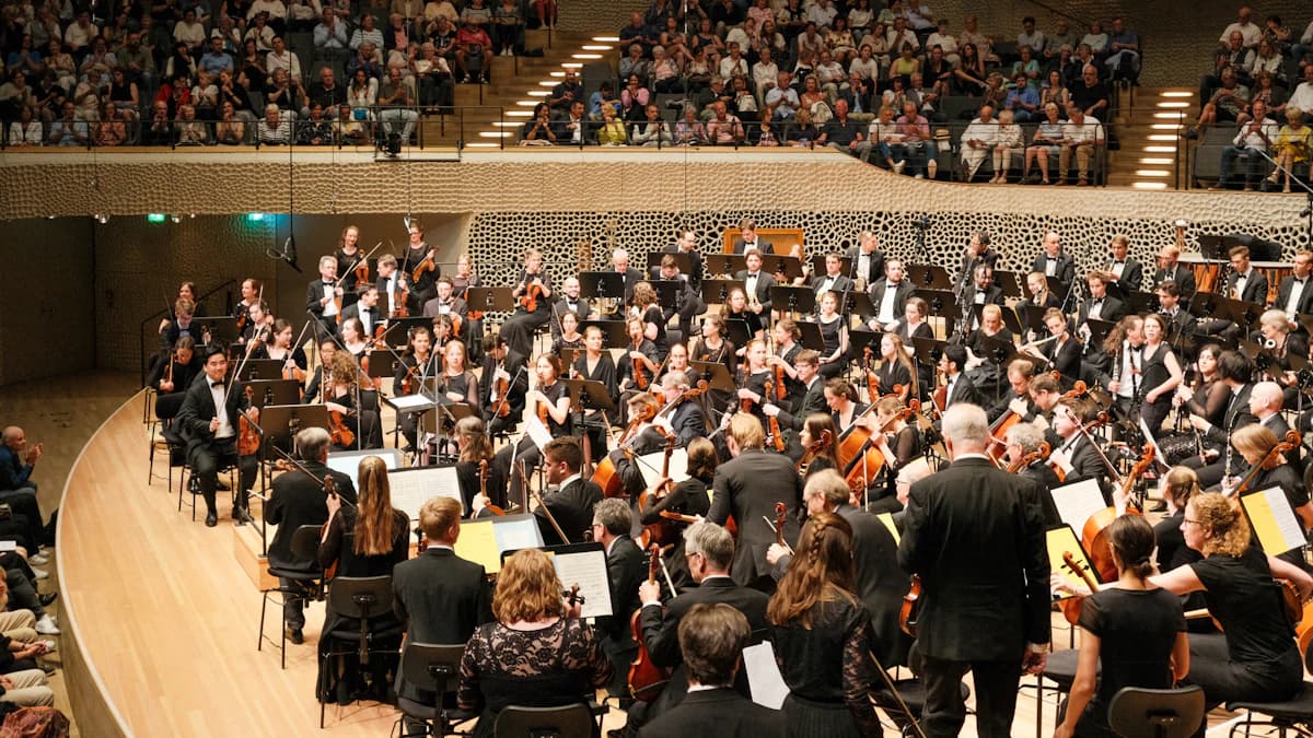 Conductor with a full symphony orchestra