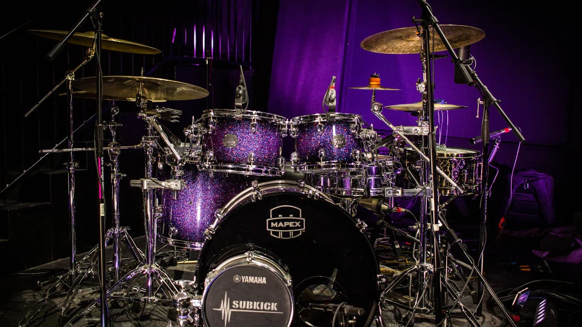 Drum kit on a lit concert stage