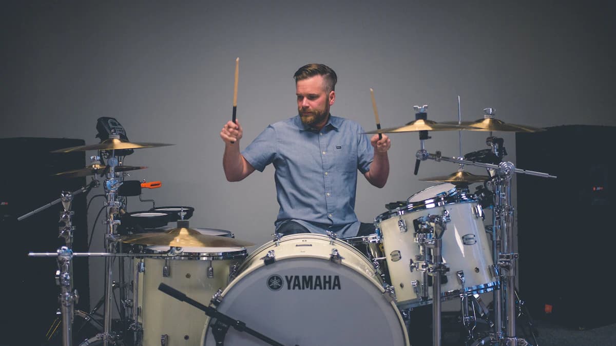 Drummer playing a full kit