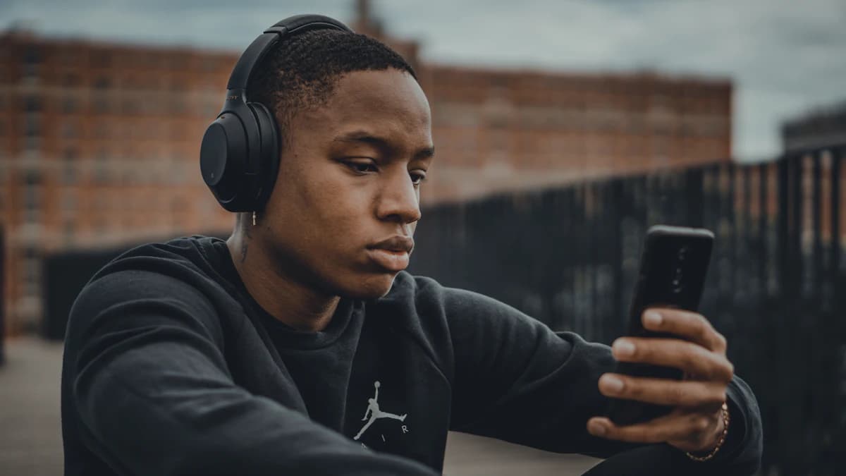 Person listening to music on headphones
